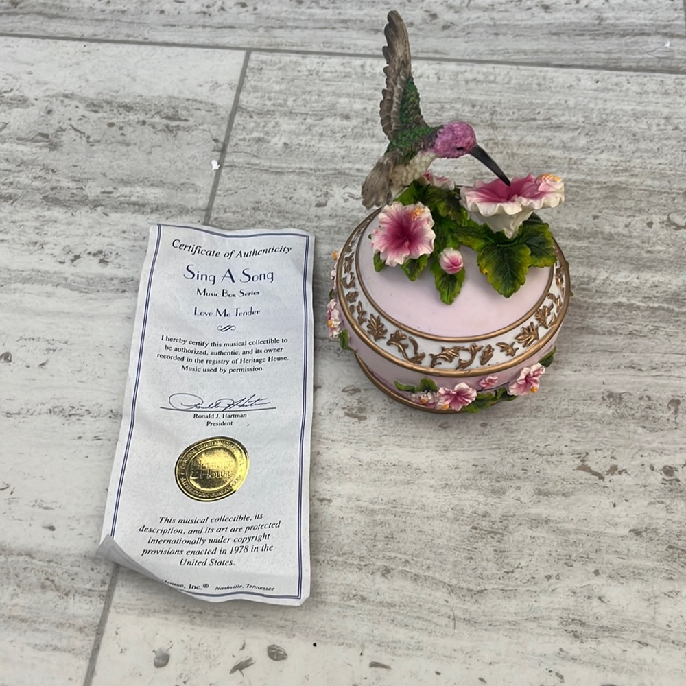 Hummingbird music box trinket holder.